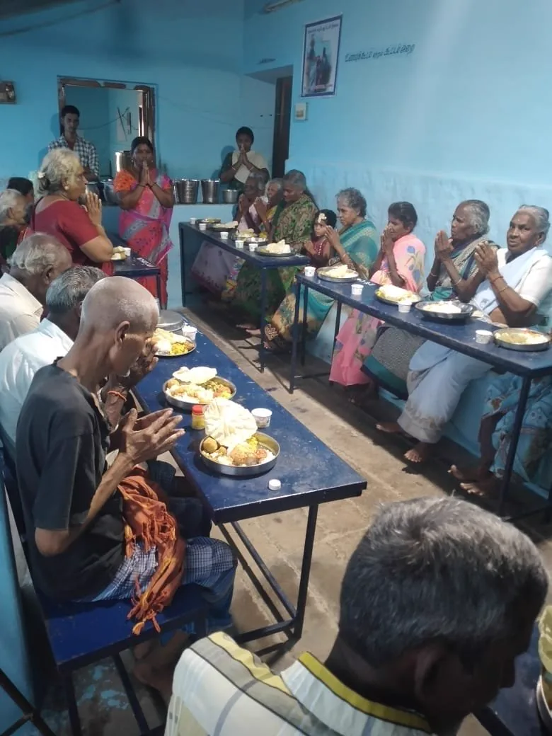 An elder having a meal at the home